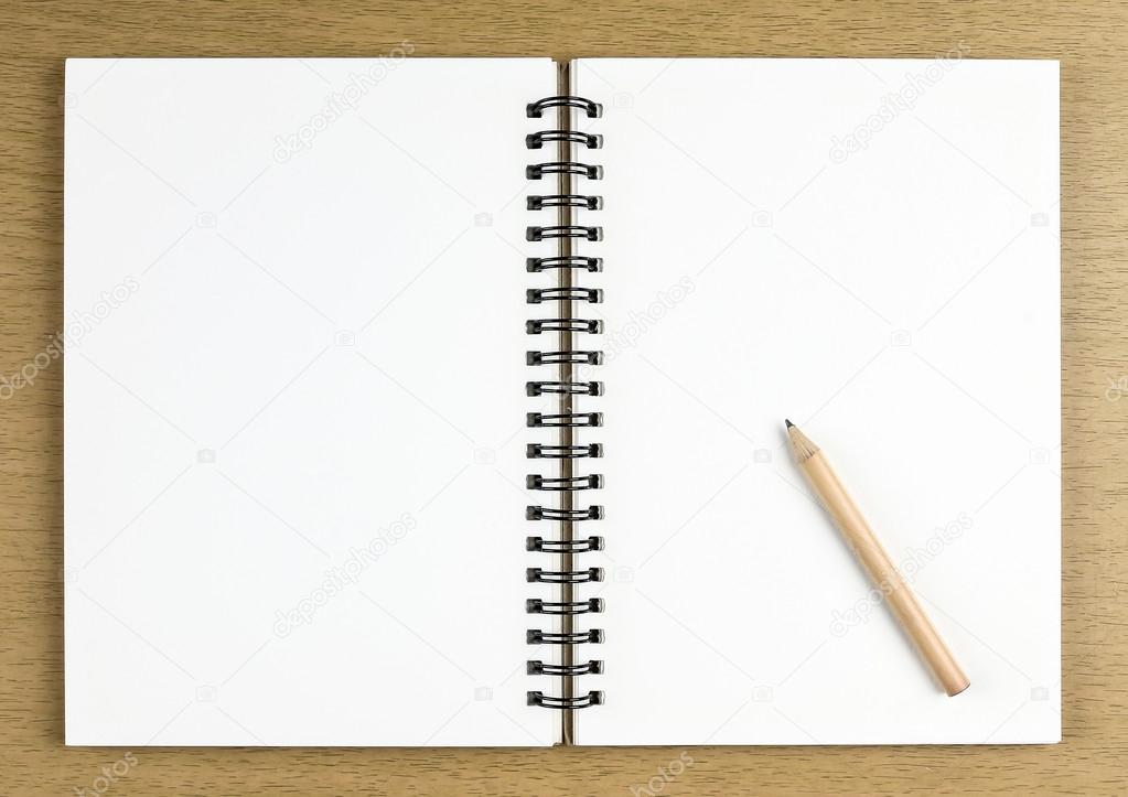 pencil and blank opened notebook