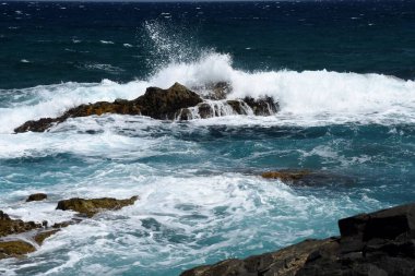 the waves showing their power