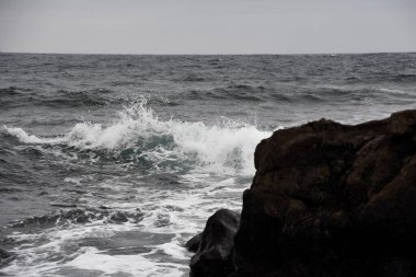 the waves showing their power