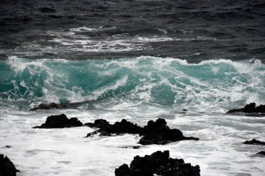 the waves showing their power