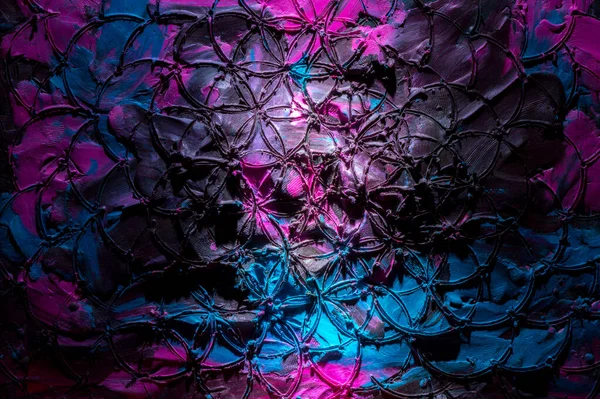 Tahtaya farklı renklerde şekil vermek için sürülmüş renkli çizim plastiksi deseni