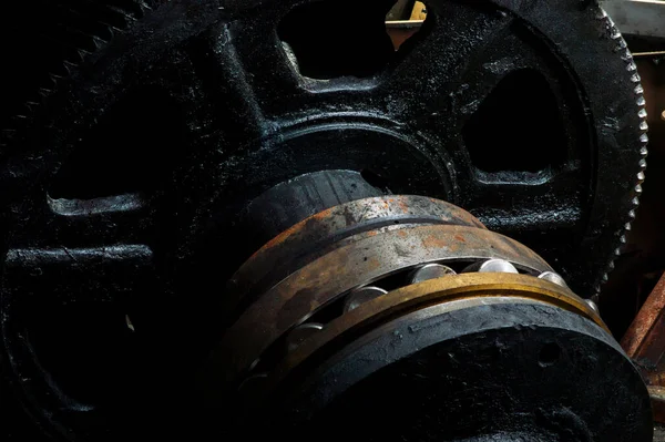 gearboxes big metal gears dirty in fuel oil