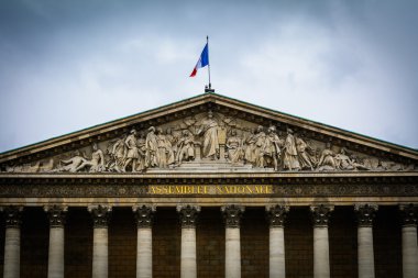 Detail of front facade of Assemblee Nationale building in Paris