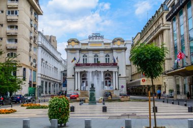 BUCHAREST, ROMANIA - AUGUST 30, 2015: The Odeon Theater is one of the best-known performing arts venues in Bucharest on Victory Avenue clipart