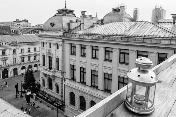 Roof-top view of a lantern over a small square. Horizontal black — Stock Photo, Image