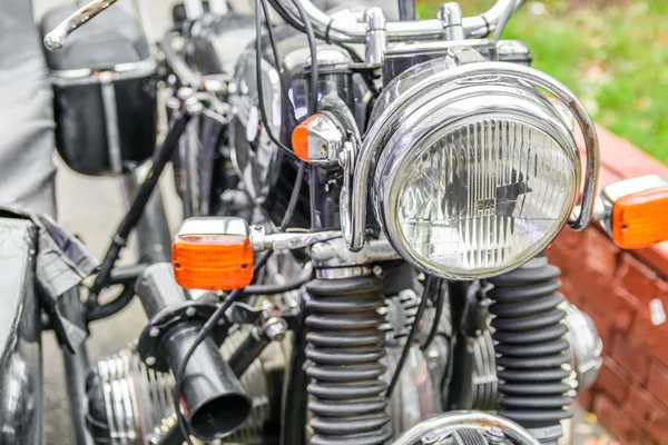 Egy motorkerékpár fényszóró részlete. Horizontális képet egy motorkeré — Stock Fotó
