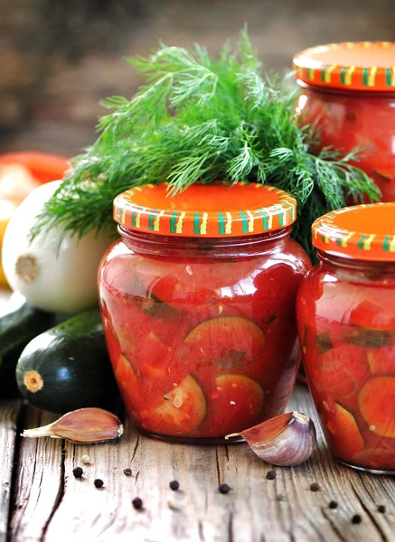 Zucchini marinated in tomato juice with onions and peppers — Stock Photo, Image