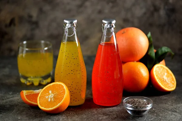 Trendy Tropical Orange Grapefruit Juice Basil Chia Seeds Bottle Organic — Stock Photo, Image