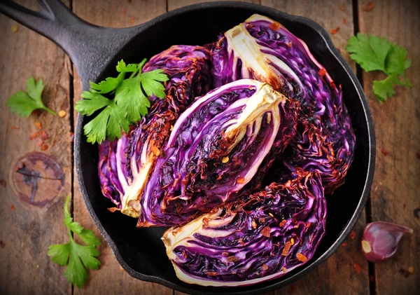red cabbage baked in olive oil with chili pepper flakes and sea salt. vegetarian food. image is tinted