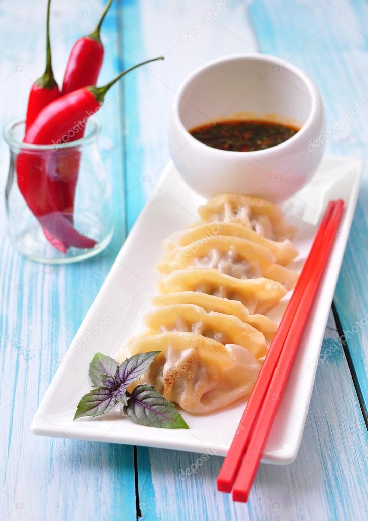 Fried asian wonton with soy sauce