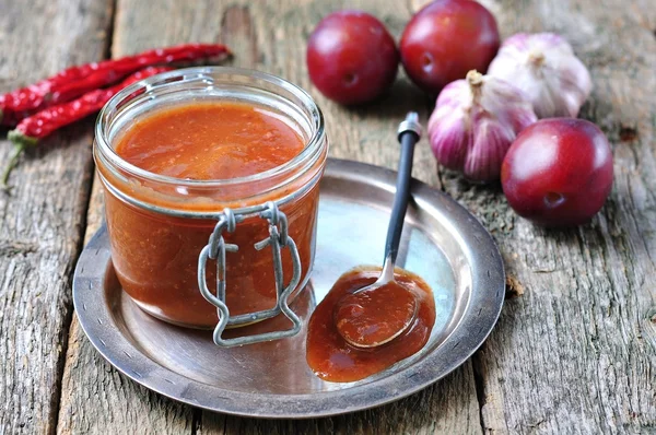 Sauce for grilled meat from organic plums with coriander, garlic and allspice — Stock Photo, Image