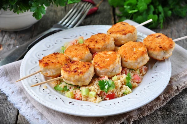 Roasted turkey meat balls with couscous and vegetables — Stockfoto
