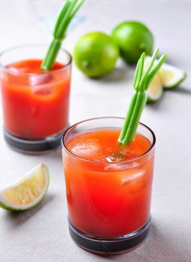Bloody Mary cocktail with celery, Tabasco, pepper, sea salt and Worcestershire sauce clipart