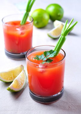 Bloody Mary cocktail with celery, Tabasco, pepper, sea salt and Worcestershire sauce