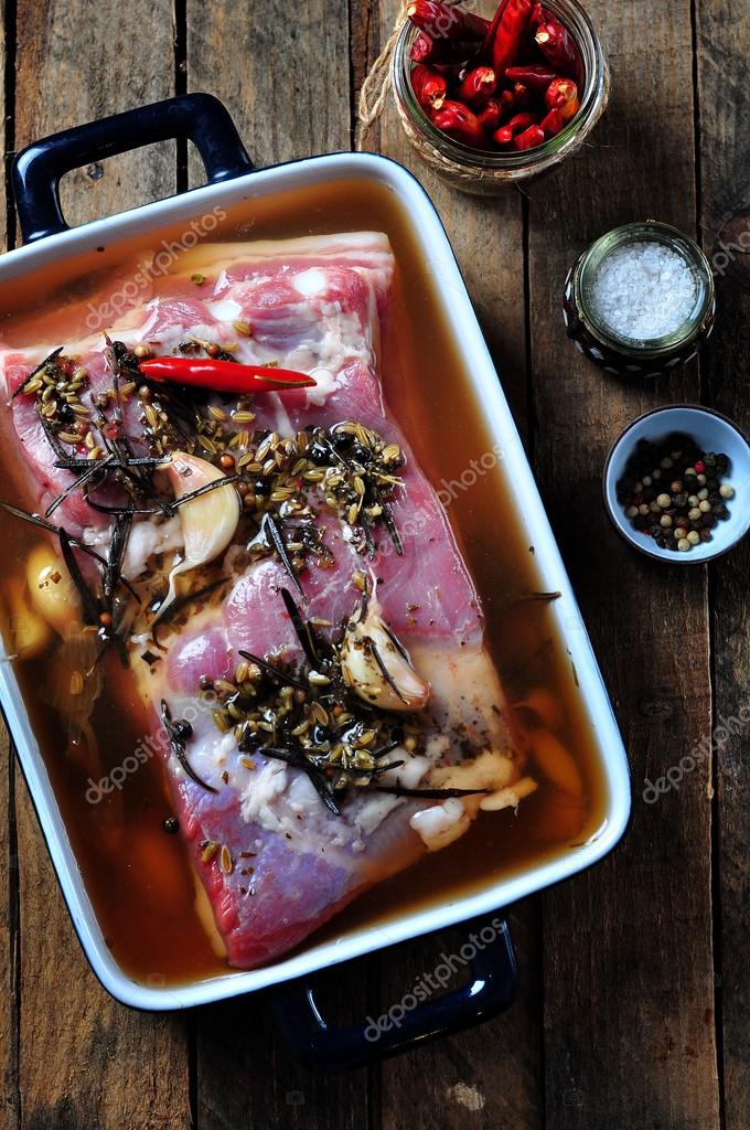 Pork belly marinated in water, sea salt, sugar, vinegar, garlic, dried