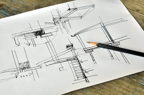 Taslak el masaya mimari plan çizimi