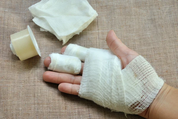 Injuery hand  with bandage — Stock Photo, Image