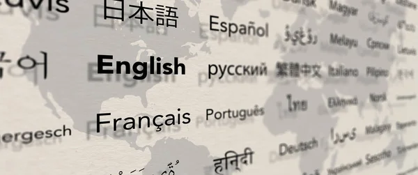 Several important languages on paper with world map background. Depth of field image. Translate and languages education concept.