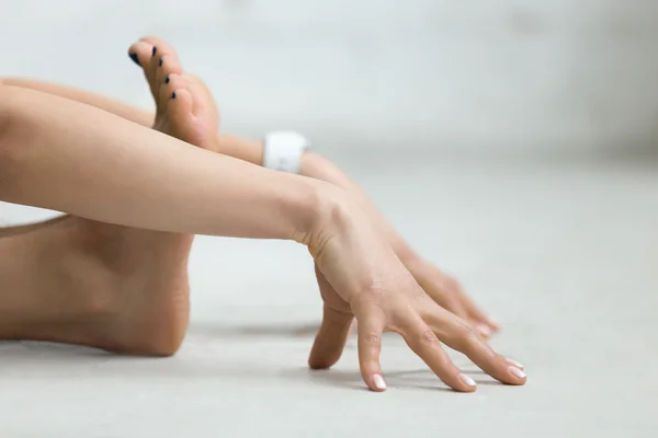 Yoga Indoors: stretching exercise — 图库照片