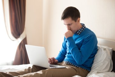 Young man focused on work