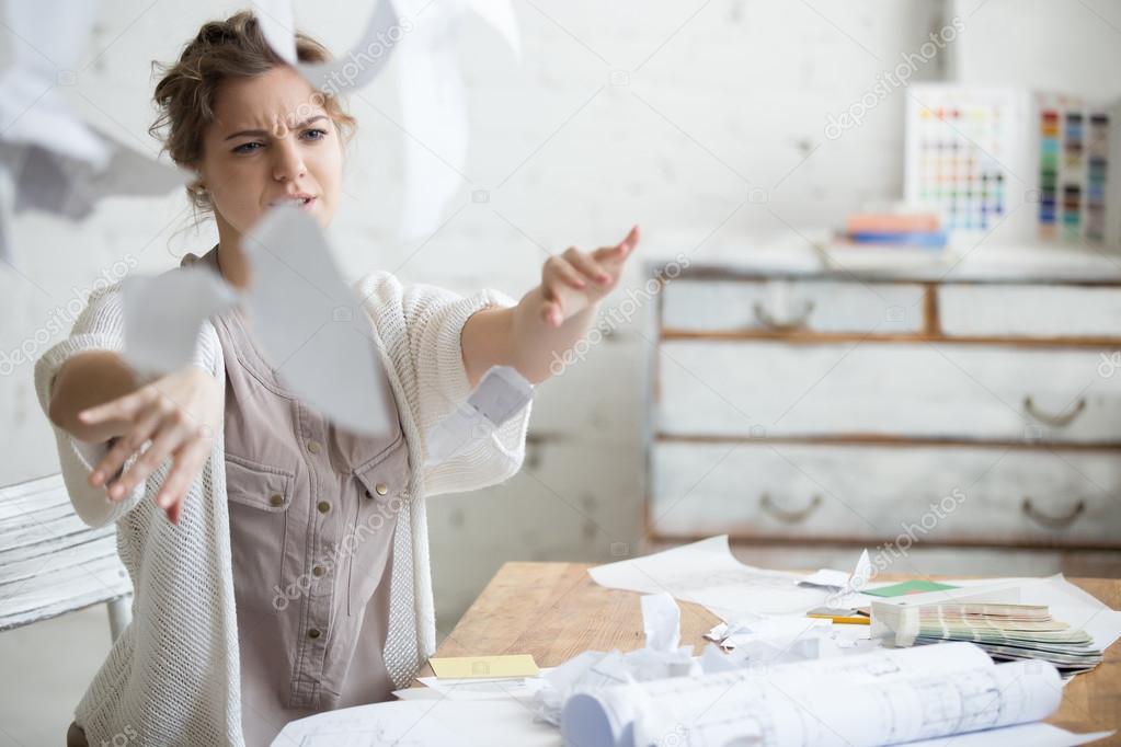 Young business woman in rage