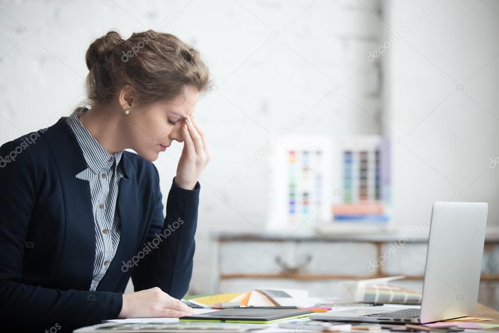 Young stressed businesswoman