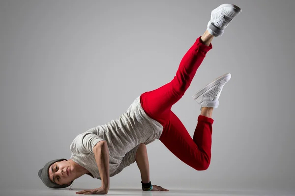 Young break-dancer doing handstand — Stock Photo, Image