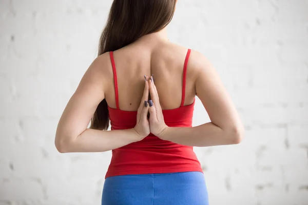 Yoga Indoors: Anjali Mudra behind the back — Stock Photo, Image