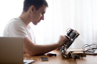 Young computer engineer working