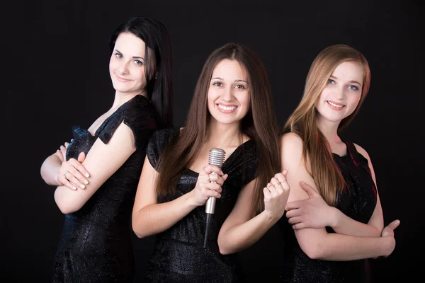 Girls musikband med mikrofon — Stockfoto