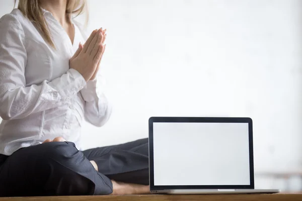 Yogi businesswoman with copy space laptop — Stock Fotó