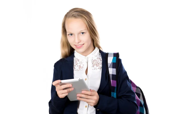 Ler skolflicka med tablett — Stockfoto