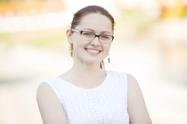 Portrait of joyful woman wearing glasses — Stock Photo, Image