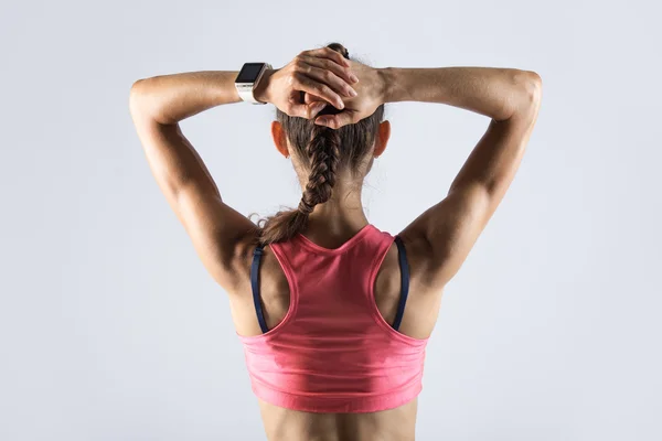 Vista posterior de chica deportiva con cuerpo atlético —  Fotos de Stock