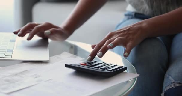 Close up young woman managing family budget. — Stock Video