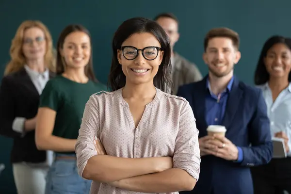 Portrait of young biracial female leader member of corporate team — Stock Photo, Image