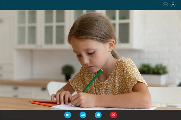 Computer video call screen view focused little girl drawing.