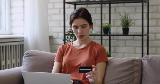 Anxious young caucasian woman dissatisfied with online payment failure. — Stock Video