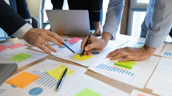 Close up of diverse businesspeople working on project in team — Stock Photo, Image