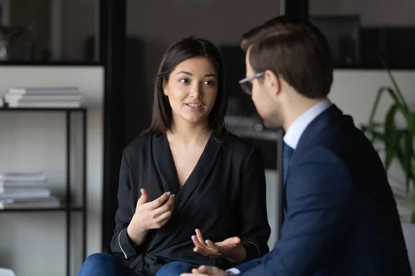 Concentrated indian female introducing herself to hr on job interview — Stock Photo, Image