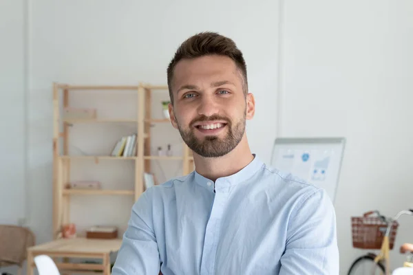 Profile picture of smiling Caucasian male employee