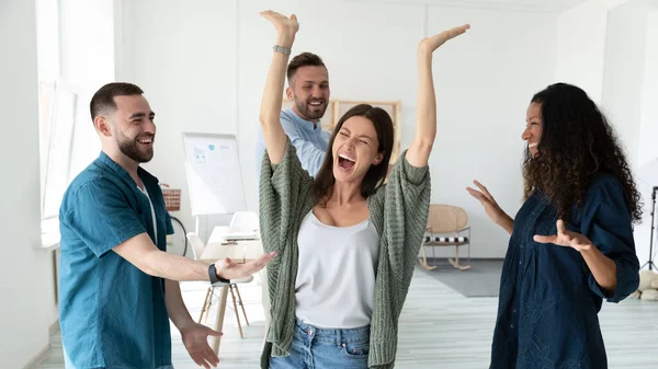 Banner view of excited diverse colleagues dance in office — Stock Photo, Image