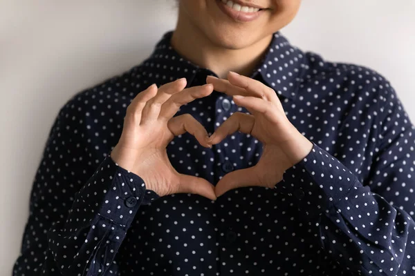 Happy young woman put fingers in heart shape express love — Stock Photo, Image