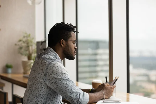 Young biracial man use smartphone gadget at home — Stock Photo, Image