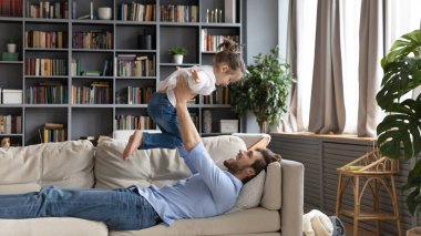 Banner view of happy father with little girl