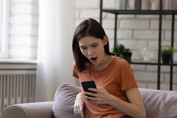 Shocked female seeing no charge at moment of important call — Stock Photo, Image