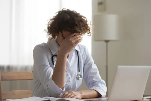 Unhappy nervous young female physician doctor worrying about medical mistake. — Stock Photo, Image