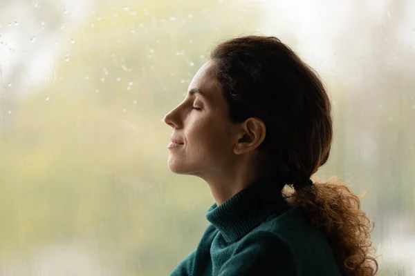 Calm young woman breathe fresh air meditating — Stock Photo, Image