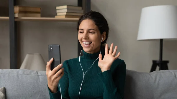 Happy young woman talk on video call on smartphone — Stock Photo, Image