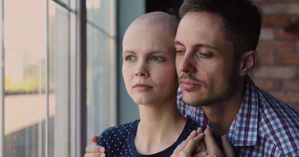 Portrait loving husband hugging bald wife suffers from cancer — Stock Video